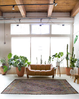 Vintage kilim rug in room decor setting, old rug, antique rug, pastel colors, faded colors, Turkish rug, vintage rug, soft rug, Portland, Oregon, rug store, rug shop, local shop, bold colors, bright colors, faded colors