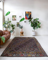 Vintage kilim rug in room decor setting, old rug, antique rug, pastel colors, faded colors, Turkish rug, vintage rug, soft rug, Portland, Oregon, rug store, rug shop, local shop, bold colors, bright colors, faded colors