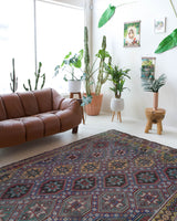 Vintage kilim rug in room decor setting, old rug, antique rug, pastel colors, faded colors, Turkish rug, vintage rug, soft rug, Portland, Oregon, rug store, rug shop, local shop, bold colors, bright colors, faded colors