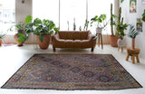 Vintage kilim rug in room decor setting, old rug, antique rug, pastel colors, faded colors, Turkish rug, vintage rug, soft rug, Portland, Oregon, rug store, rug shop, local shop, bold colors, bright colors, faded colors