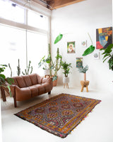 Vintage kilim rug in living room setting, bright colors, wild shaman, soft rug, bold color, Portland, Oregon, rug store, rug shop, local shop, vintage rug, modern kilim, warm colors