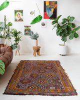 Vintage kilim rug in living room setting, bright colors, wild shaman, soft rug, bold color, Portland, Oregon, rug store, rug shop, local shop, vintage rug, modern kilim, warm colors