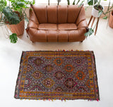 Vintage kilim rug in living room setting, bright colors, wild shaman, soft rug, bold color, Portland, Oregon, rug store, rug shop, local shop, vintage rug, modern kilim, warm colors