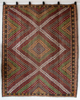 Vintage kilim rug in room decor setting, old rug, antique rug, pastel colors, faded colors, Turkish rug, vintage rug, soft rug, Portland, Oregon, rug store, rug shop, local shop, bold colors, bright colors, faded colors