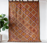 Vintage kilim rug in room decor setting, old rug, antique rug, pastel colors, faded colors, Turkish rug, vintage rug, soft rug, Portland, Oregon, rug store, rug shop, local shop, bold colors, bright colors, faded colors