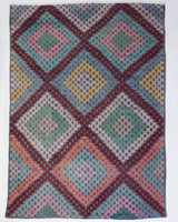 Vintage kilim rug in living room setting, old rug, antique rug, pastel colors, faded colors, Turkish rug, vintage rug, soft rug, Portland, Oregon, rug store, rug shop, local shop, earthy tones, earthy colors, warm colors