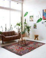 Vintage kilim rug in living room setting, bright colors, wild shaman, soft rug, bold color, Portland, Oregon, rug store, rug shop, local shop, vintage rug, modern kilim, warm colors