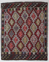 Vintage kilim rug in living room setting, bright colors, wild shaman, soft rug, bold color, Portland, Oregon, rug store, rug shop, local shop, vintage rug, modern kilim, warm colors