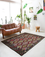 Vintage kilim rug in living room setting, bright colors, wild shaman, soft rug, bold color, Portland, Oregon, rug store, rug shop, local shop, vintage rug, modern kilim, warm colors