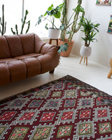Vintage kilim rug in living room setting, bright colors, wild shaman, soft rug, bold color, Portland, Oregon, rug store, rug shop, local shop, vintage rug, modern kilim, warm colors