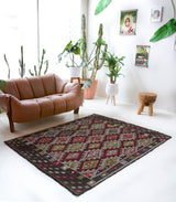 Vintage kilim rug in living room setting, bright colors, wild shaman, soft rug, bold color, Portland, Oregon, rug store, rug shop, local shop, vintage rug, modern kilim, warm colors