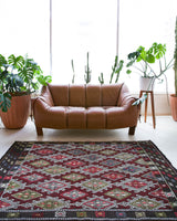 Vintage kilim rug in living room setting, bright colors, wild shaman, soft rug, bold color, Portland, Oregon, rug store, rug shop, local shop, vintage rug, modern kilim, warm colors