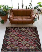 Vintage kilim rug in living room setting, bright colors, wild shaman, soft rug, bold color, Portland, Oregon, rug store, rug shop, local shop, vintage rug, modern kilim, warm colors