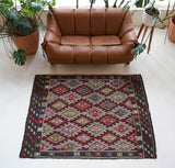 Vintage kilim rug in living room setting, bright colors, wild shaman, soft rug, bold color, Portland, Oregon, rug store, rug shop, local shop, vintage rug, modern kilim, warm colors