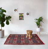 Vintage kilim rug in living room setting, bright colors, wild shaman, soft rug, bold color, Portland, Oregon, rug store, rug shop, local shop, vintage rug, modern kilim, warm colors