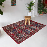 Vintage kilim rug in living room setting, bright colors, wild shaman, soft rug, bold color, Portland, Oregon, rug store, rug shop, local shop, vintage rug, modern kilim, warm colors