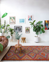 Vintage kilim rug in living room setting, bright colors, wild shaman, soft rug, bold color, Portland, Oregon, rug store, rug shop, local shop, vintage rug, modern kilim, warm colors