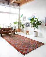 Vintage kilim rug in living room setting, bright colors, wild shaman, soft rug, bold color, Portland, Oregon, rug store, rug shop, local shop, vintage rug, modern kilim, warm colors