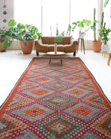 Vintage kilim rug in living room setting, bright colors, wild shaman, soft rug, bold color, Portland, Oregon, rug store, rug shop, local shop, vintage rug, modern kilim, warm colors