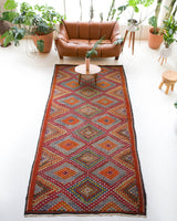 Vintage kilim rug in living room setting, bright colors, wild shaman, soft rug, bold color, Portland, Oregon, rug store, rug shop, local shop, vintage rug, modern kilim, warm colors