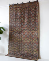 Vintage kilim rug in room decor setting, old rug, antique rug, pastel colors, faded colors, Turkish rug, vintage rug, soft rug, Portland, Oregon, rug store, rug shop, local shop, bold colors, bright colors, faded colors