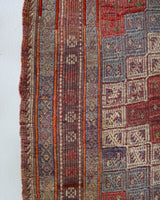 Vintage kilim rug in living room setting, old rug, antique rug, pastel colors, faded colors, Turkish rug, vintage rug, soft rug, Portland, Oregon, rug store, rug shop, local shop, earthy tones, earthy colors, warm colors