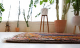 Vintage Turkish rug in a living room setting, pile rug, Turkish rug, vintage rug, portland, rug shop, bright colors, wild shaman, soft rug, bold color, Portland, Oregon, rug store, rug shop, local shop, antique rug
