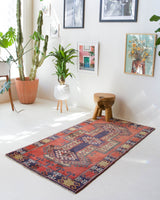 Vintage Turkish rug in living room setting, old rug, antique rug, pastel colors, faded colors, Turkish rug, vintage rug, soft rug, Portland, Oregon, rug store, rug shop, local shop