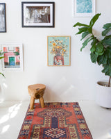 Vintage Turkish rug in living room setting, old rug, antique rug, pastel colors, faded colors, Turkish rug, vintage rug, soft rug, Portland, Oregon, rug store, rug shop, local shop