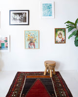 Vintage Turkish rug in a living room setting, pile rug, Turkish rug, vintage rug, portland, rug shop, bright colors, wild shaman, soft rug, bold color, Portland, Oregon, rug store, rug shop, local shop, antique rug