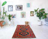 Vintage caucasian rug in a living room setting, pile rug, Turkish rug, vintage rug, portland, rug shop, bright colors, wild shaman, soft rug, bold color, Portland, Oregon, rug store, rug shop, local shop, soft rug, pastel colors, faded colors