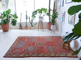 Vintage Turkish rug in living room setting, old rug, antique rug, pastel colors, faded colors, Turkish rug, vintage rug, soft rug, Portland, Oregon, rug store, rug shop, local shop