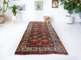 Vintage Turkish runner rug in living room setting, old rug, antique rug, pastel colors, faded colors, Turkish rug, vintage rug, soft rug, Portland, Oregon, rug store, rug shop, local shop