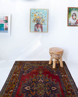 Vintage Turkish rug in a living room setting, pile rug, Turkish rug, vintage rug, portland, rug shop, bright colors, wild shaman, soft rug, bold color, Portland, Oregon, rug store, rug shop, local shop, antique rug