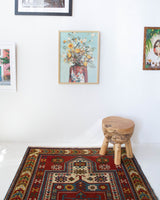 Vintage Turkish rug in living room setting, old rug, antique rug, pastel colors, faded colors, Turkish rug, vintage rug, soft rug, Portland, Oregon, rug store, rug shop, local shop