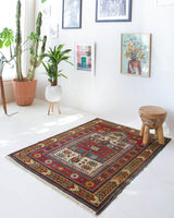 Vintage Turkish rug in living room setting, old rug, antique rug, pastel colors, faded colors, Turkish rug, vintage rug, soft rug, Portland, Oregon, rug store, rug shop, local shop
