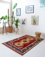 Vintage Turkish rug in a living room setting, pile rug, Turkish rug, vintage rug, portland, rug shop, bright colors, wild shaman, soft rug, bold color, Portland, Oregon, rug store, rug shop, local shop, antique rug