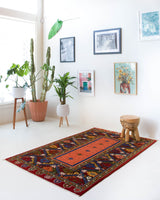 Vintage Turkish rug in a living room setting, pile rug, Turkish rug, vintage rug, portland, rug shop, bright colors, wild shaman, soft rug, bold color, Portland, Oregon, rug store, rug shop, local shop, antique rug