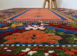 Vintage Turkish rug in a living room setting, pile rug, Turkish rug, vintage rug, portland, rug shop, bright colors, wild shaman, soft rug, bold color, Portland, Oregon, rug store, rug shop, local shop, antique rug