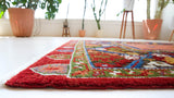 Vintage Turkish rug in a living room setting, pile rug, Turkish rug, vintage rug, portland, rug shop, bright colors, wild shaman, soft rug, bold color, Portland, Oregon, rug store, rug shop, local shop, antique rug