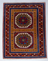 Vintage Turkish rug in a living room setting, pile rug, Turkish rug, vintage rug, portland, rug shop, bright colors, wild shaman, soft rug, bold color, Portland, Oregon, rug store, rug shop, local shop, antique rug