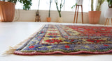 Vintage Turkish rug in a living room setting, pile rug, Turkish rug, vintage rug, portland, rug shop, bright colors, wild shaman, soft rug, bold color, Portland, Oregon, rug store, rug shop, local shop, antique rug