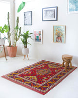 Vintage Turkish rug in a living room setting, pile rug, Turkish rug, vintage rug, portland, rug shop, bright colors, wild shaman, soft rug, bold color, Portland, Oregon, rug store, rug shop, local shop, antique rug