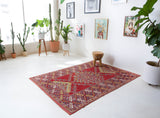Vintage Turkish rug in a living room setting, pile rug, Turkish rug, vintage rug, portland, rug shop, bright colors, wild shaman, soft rug, bold color, Portland, Oregon, rug store, rug shop, local shop, antique rug