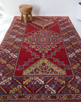 Vintage Turkish rug in a living room setting, pile rug, Turkish rug, vintage rug, portland, rug shop, bright colors, wild shaman, soft rug, bold color, Portland, Oregon, rug store, rug shop, local shop, antique rug