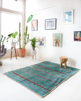 Vintage Turkish rug in living room setting, old rug, antique rug, pastel colors, faded colors, Turkish rug, vintage rug, soft rug, Portland, Oregon, rug store, rug shop, local shop