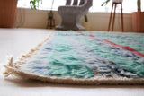 Vintage Turkish rug in living room setting, old rug, antique rug, pastel colors, faded colors, Turkish rug, vintage rug, soft rug, Portland, Oregon, rug store, rug shop, local shop