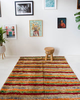 Vintage Turkish rug in a living room setting, pile rug, Turkish rug, vintage rug, portland, rug shop, bright colors, wild shaman, soft rug, bold color, Portland, Oregon, rug store, rug shop, local shop