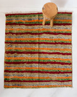 Vintage Turkish rug in a living room setting, pile rug, Turkish rug, vintage rug, portland, rug shop, bright colors, wild shaman, soft rug, bold color, Portland, Oregon, rug store, rug shop, local shop