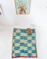 Vintage Turkish rug in living room setting, old rug, antique rug, pastel colors, faded colors, Turkish rug, vintage rug, soft rug, Portland, Oregon, rug store, rug shop, local shop